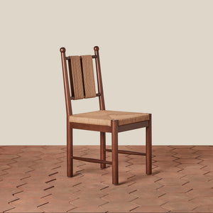 Wooden chair with woven backrest on a beige background - Number 1