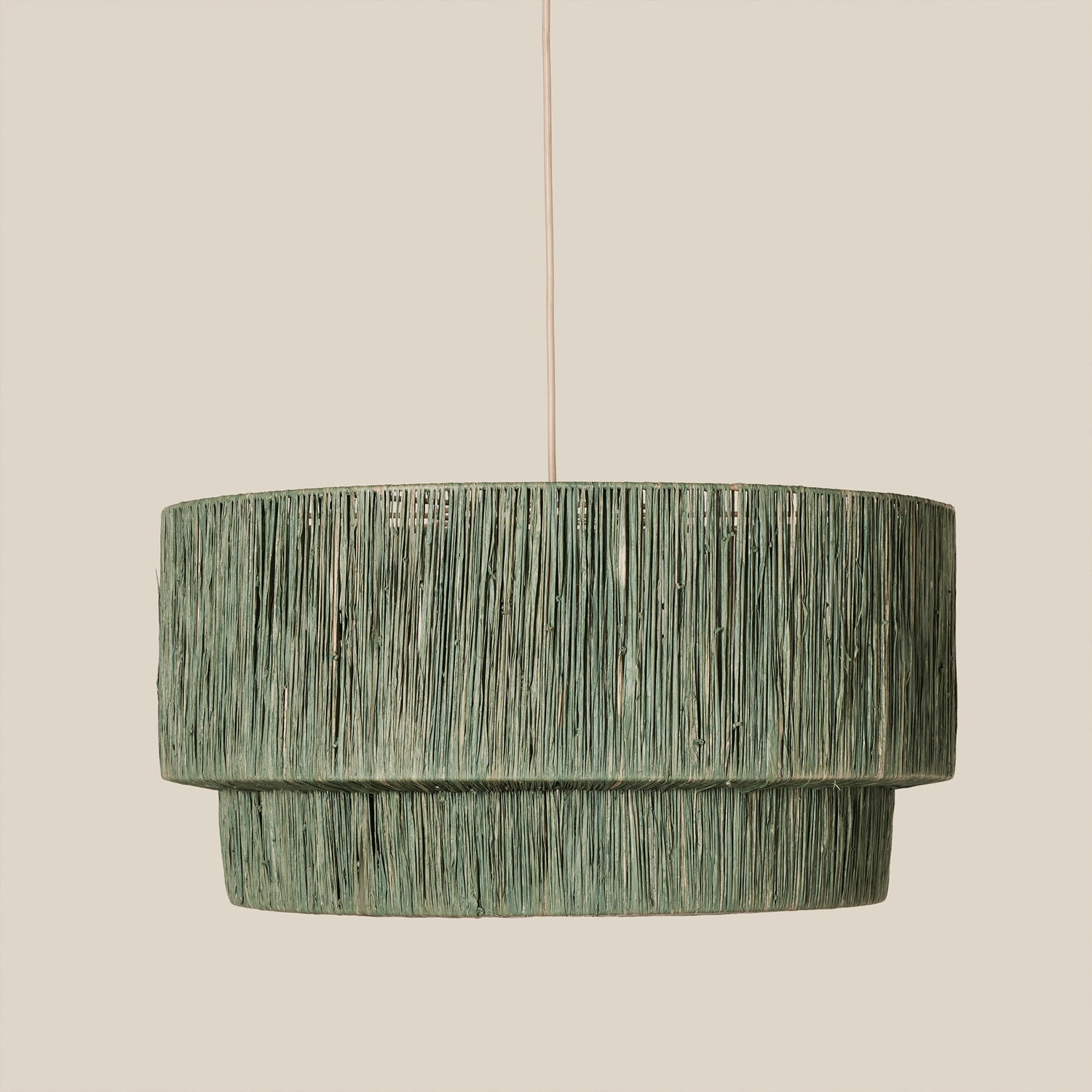 Green pendant light on a beige background- Number 6
