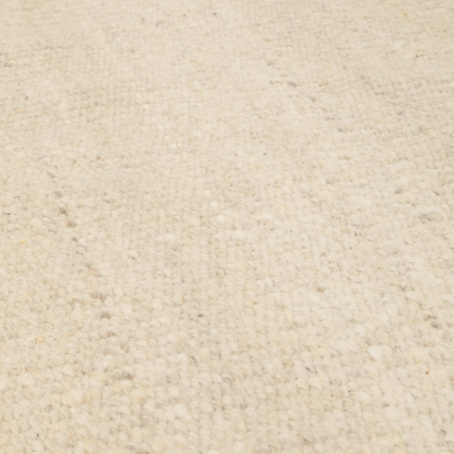 Close-up of a textured beige fabric surface- Number 4