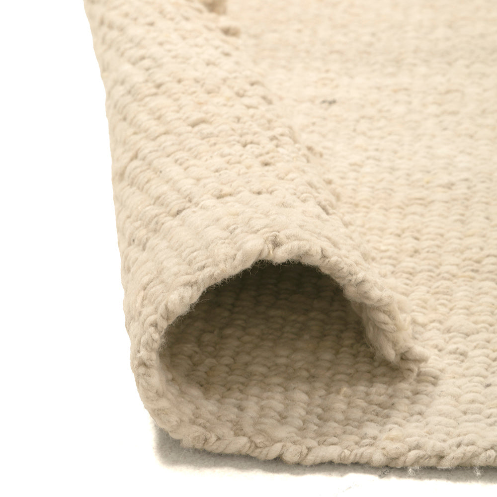 Textured beige cat bed with a rounded entrance on a white background- Number 3