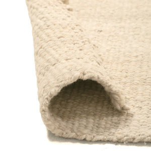 Textured beige cat bed with a rounded entrance on a white background - Number 3