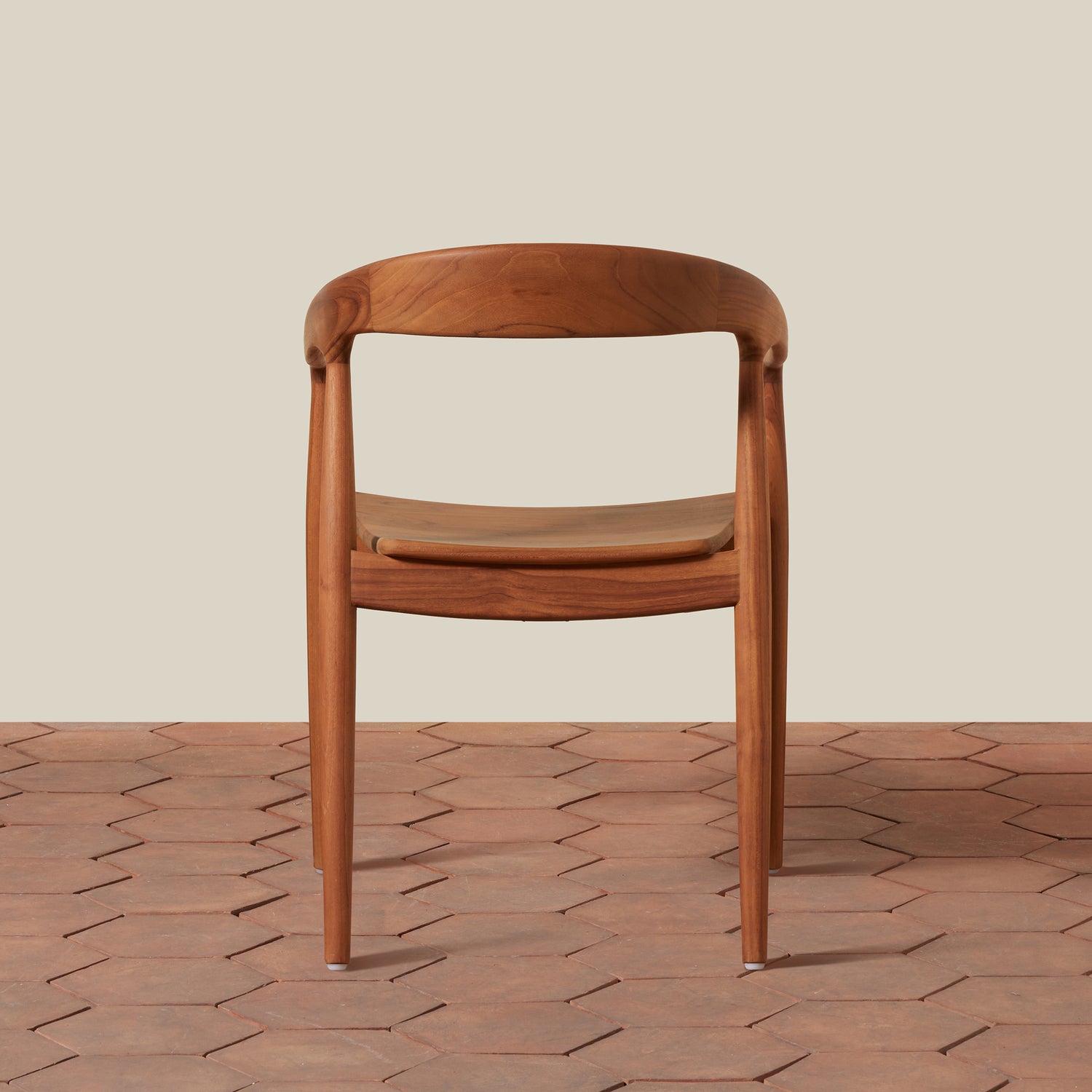 Wooden chair on a wooden floor with a beige background- Number 6