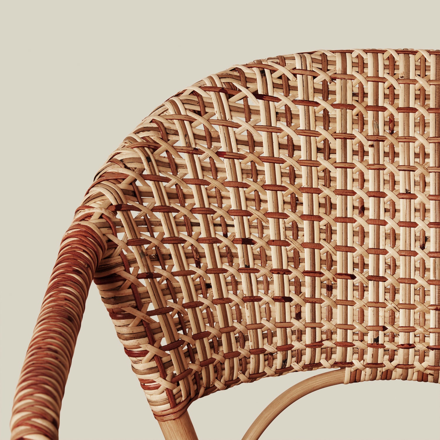 close up of woven chair back against neutral background- Number 9