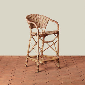 beige woven counter stool on tile floor with neutral background - Number 1