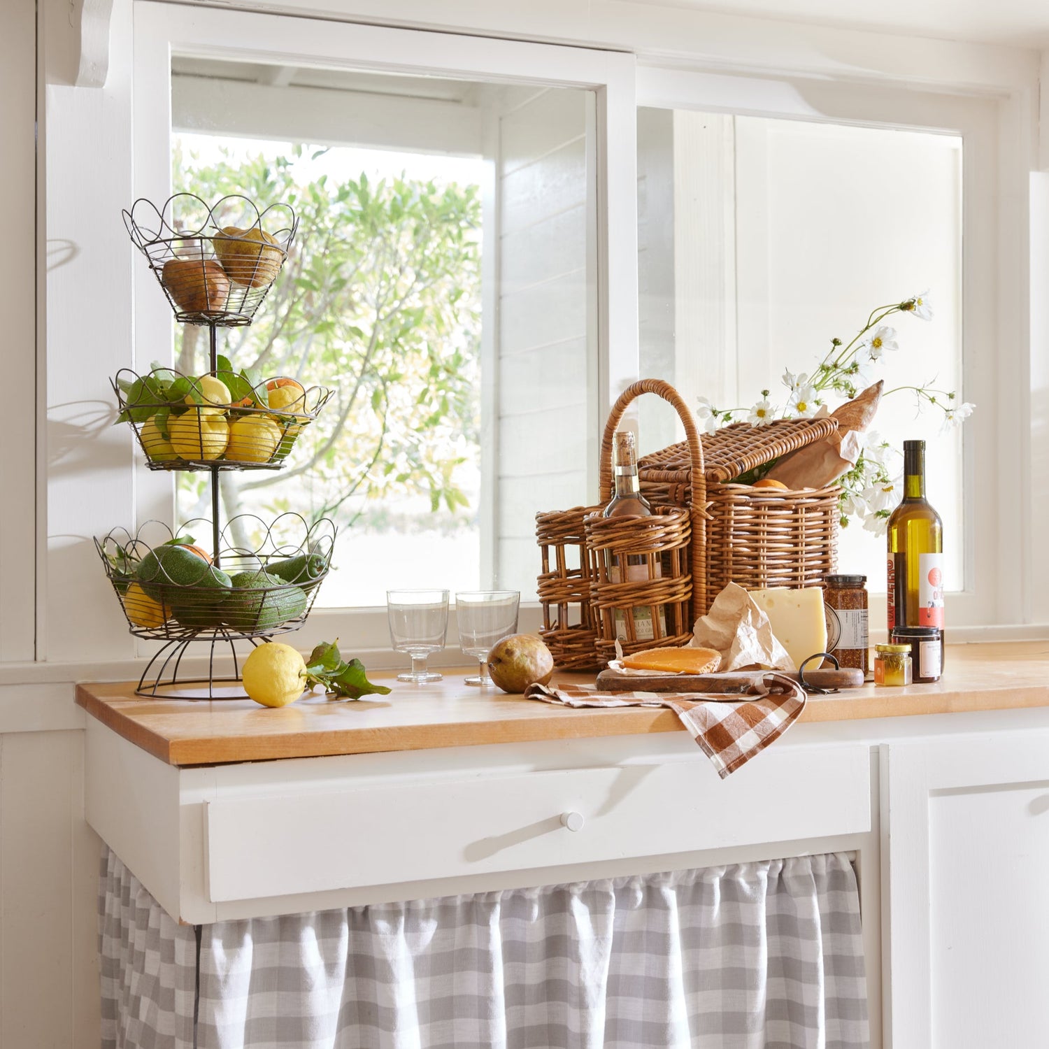 picnic basket on counter next to lemons and limes- Number 2