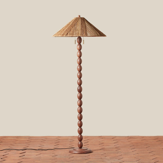 jute and wood floor lamp on tiled floor