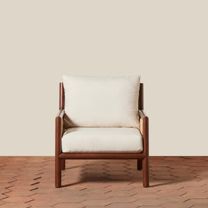 Wooden armchair with white cushions on a wooden floor and beige wall background - Number 3