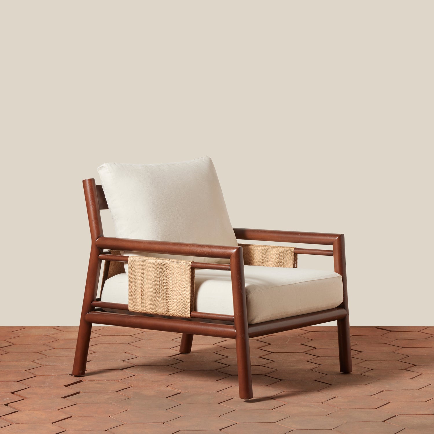 Wooden armchair with white cushion on a wooden floor and beige wall background- Number 1