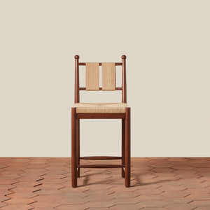 Wooden chair with woven backrest and seat on a wooden floor. - Number 3