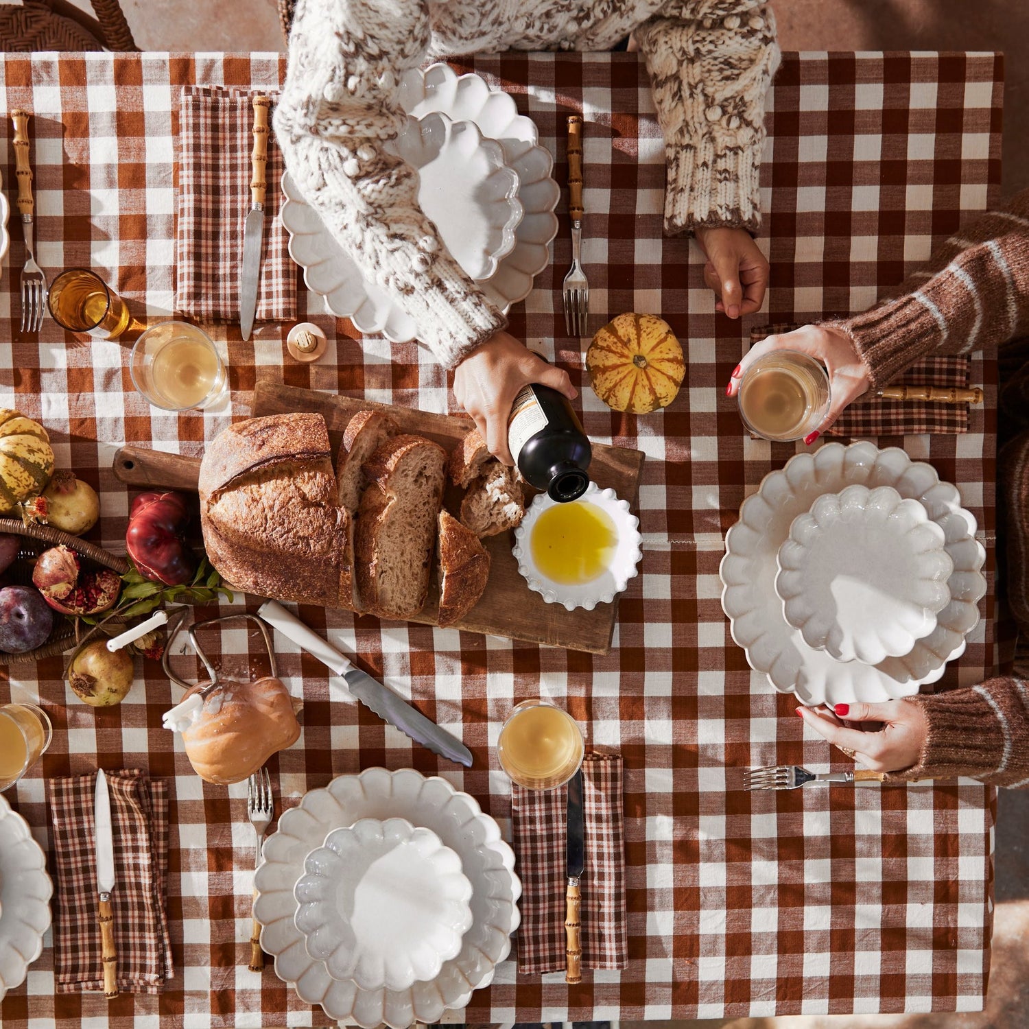 table setting with white plates and gingham tablecloth- Number 2