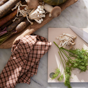 plaid napkins next to mushrooms - Number 2