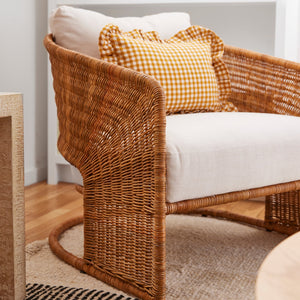 rattan lounge chair with white cushions and orange pillow - Number 3