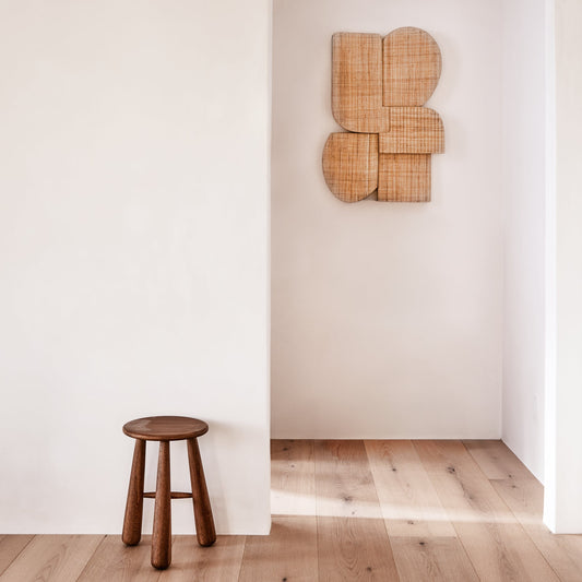 brown wall hanging against white background with brown stool on wooden floor - Image 2