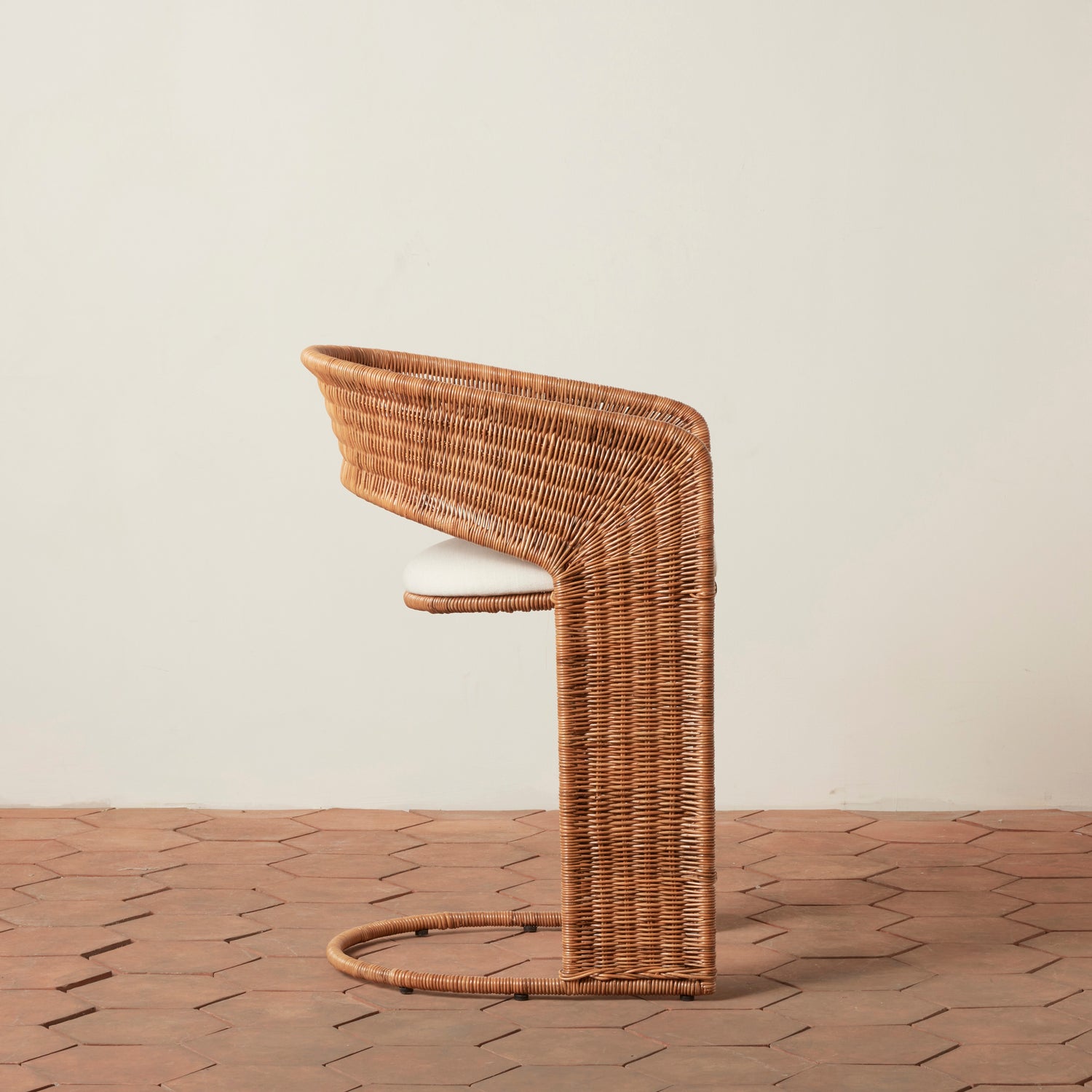 side view of counter stool with round back and rattan sides- Number 4
