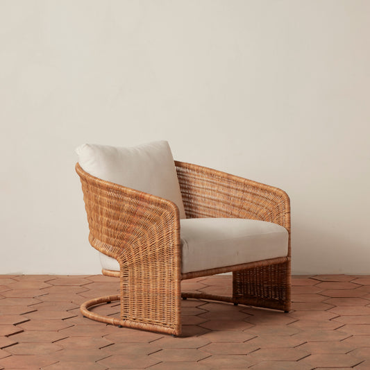 angle view of lounge chair with rattan sides
