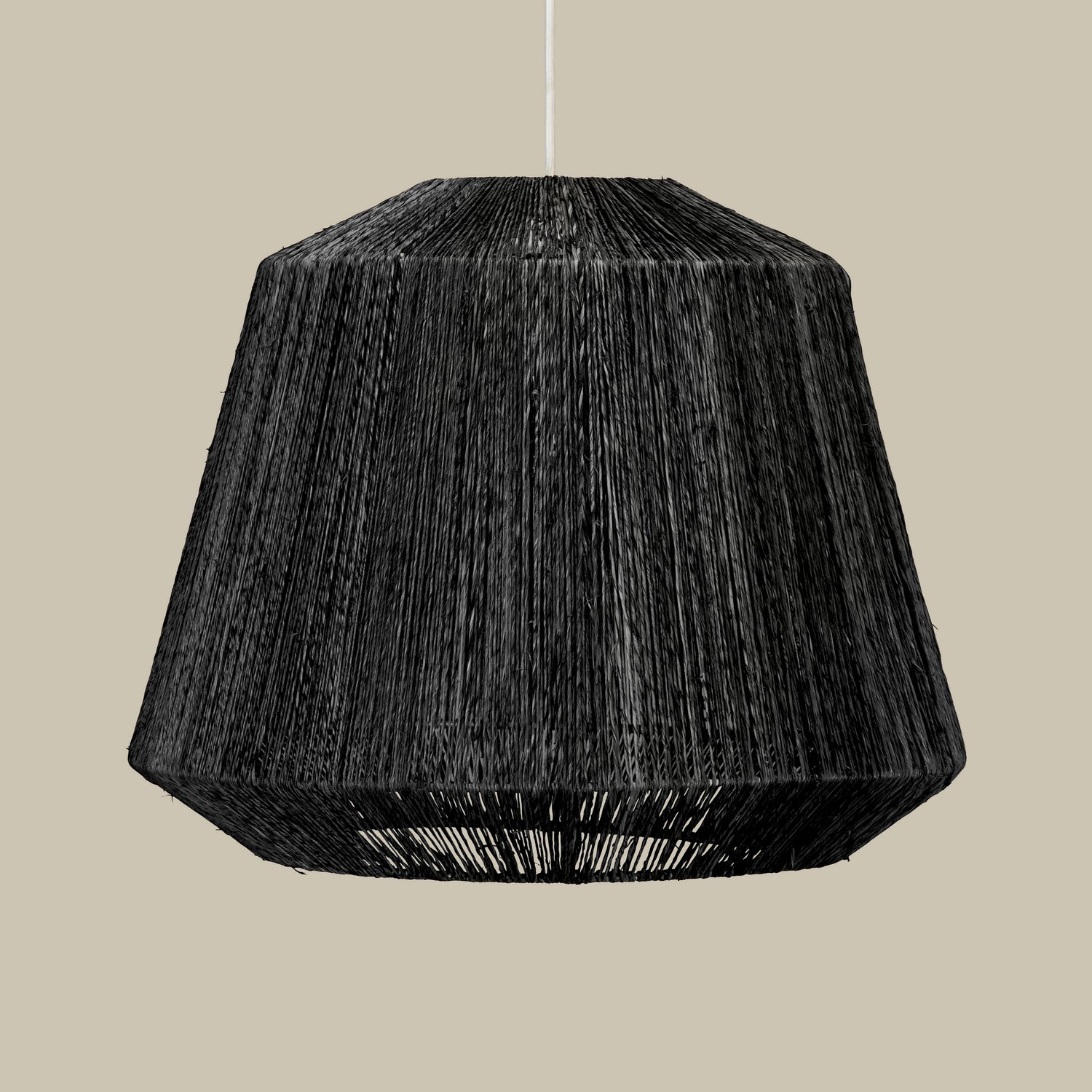 Black textured pendant light on a beige background- Number 5