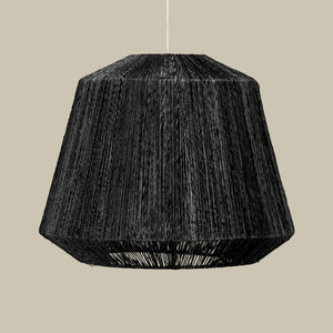 Black textured pendant light on a beige background - Number 5