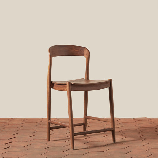 angle view of teak counter stool