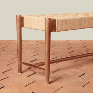 Wooden bench with woven seat on a patterned wooden floor - Number 3