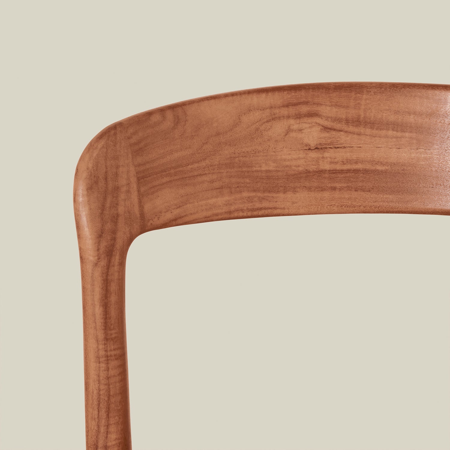 Close-up of a wooden chair seat on a beige background- Number 7