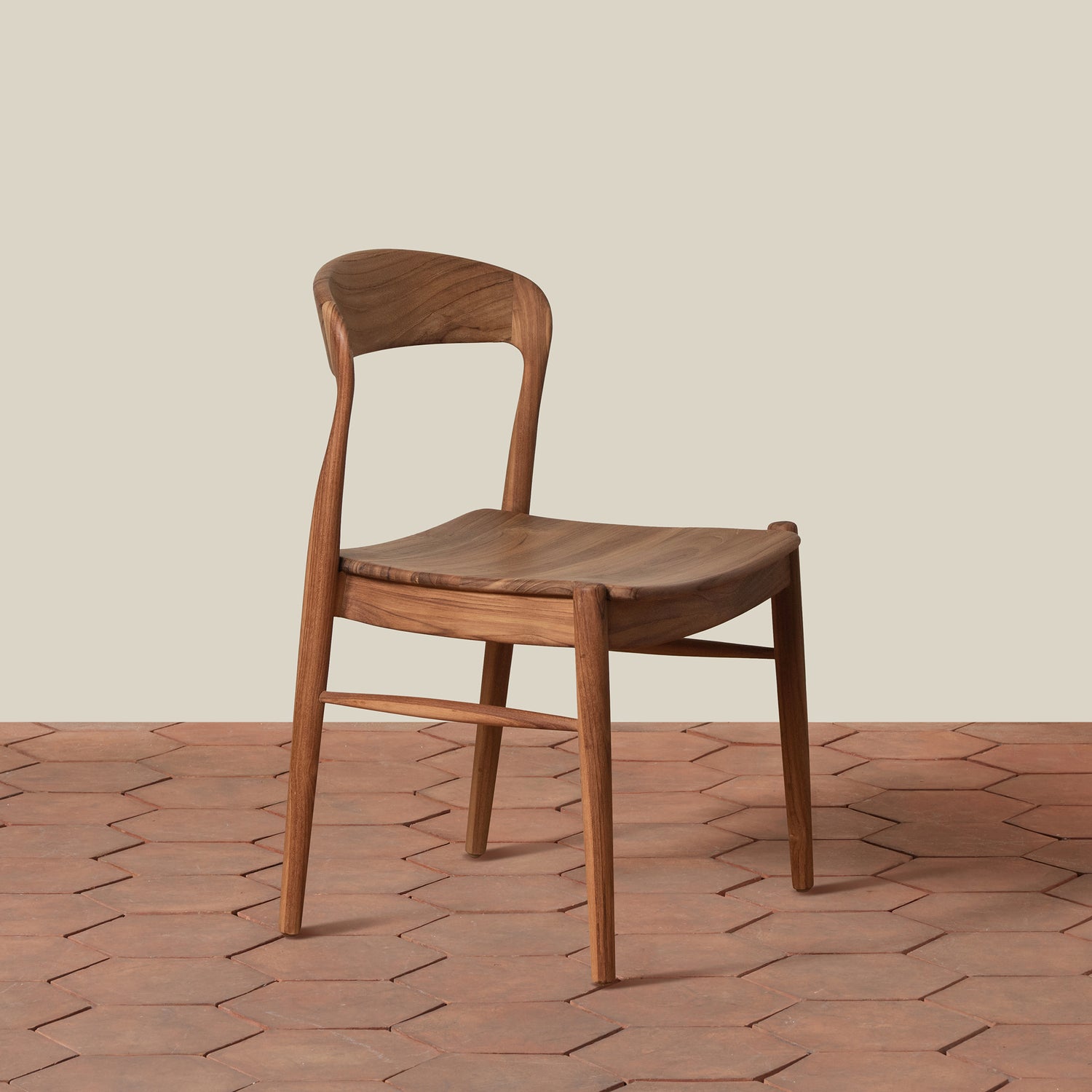 Wooden chair on a wooden floor with a neutral background- Number 1