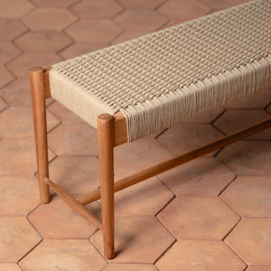 Wooden bench with woven seat on a terracotta tiled floor - Number 4