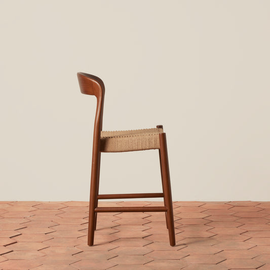 side angle of counter stool with woven seat - Image 2