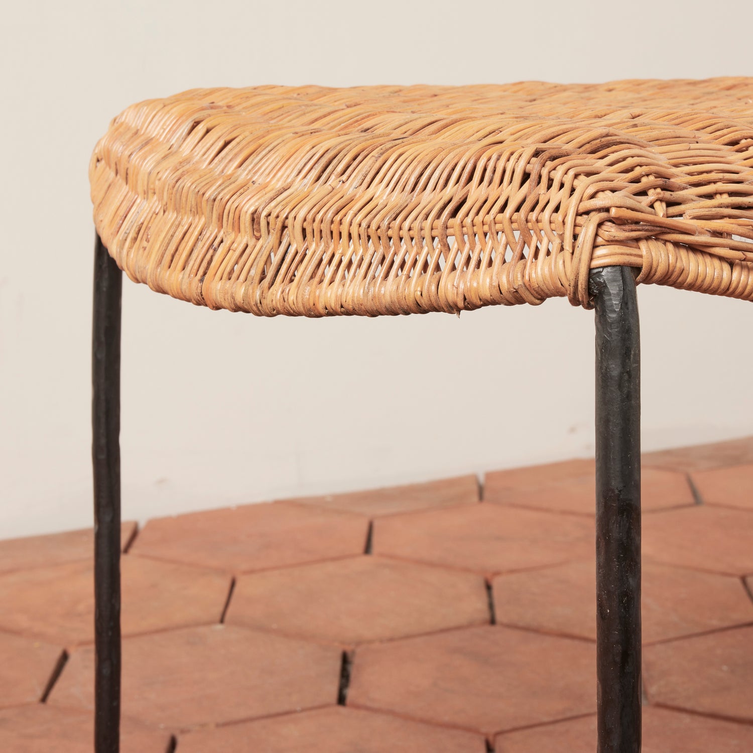 Wicker stool with metal legs on a stone surface- Number 7