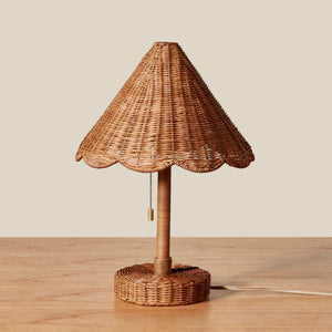 Wicker table lamp with scalloped shade on a wooden surface - Number 1