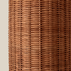 Close-up of a woven brown wall sconce on a beige background - Number 5