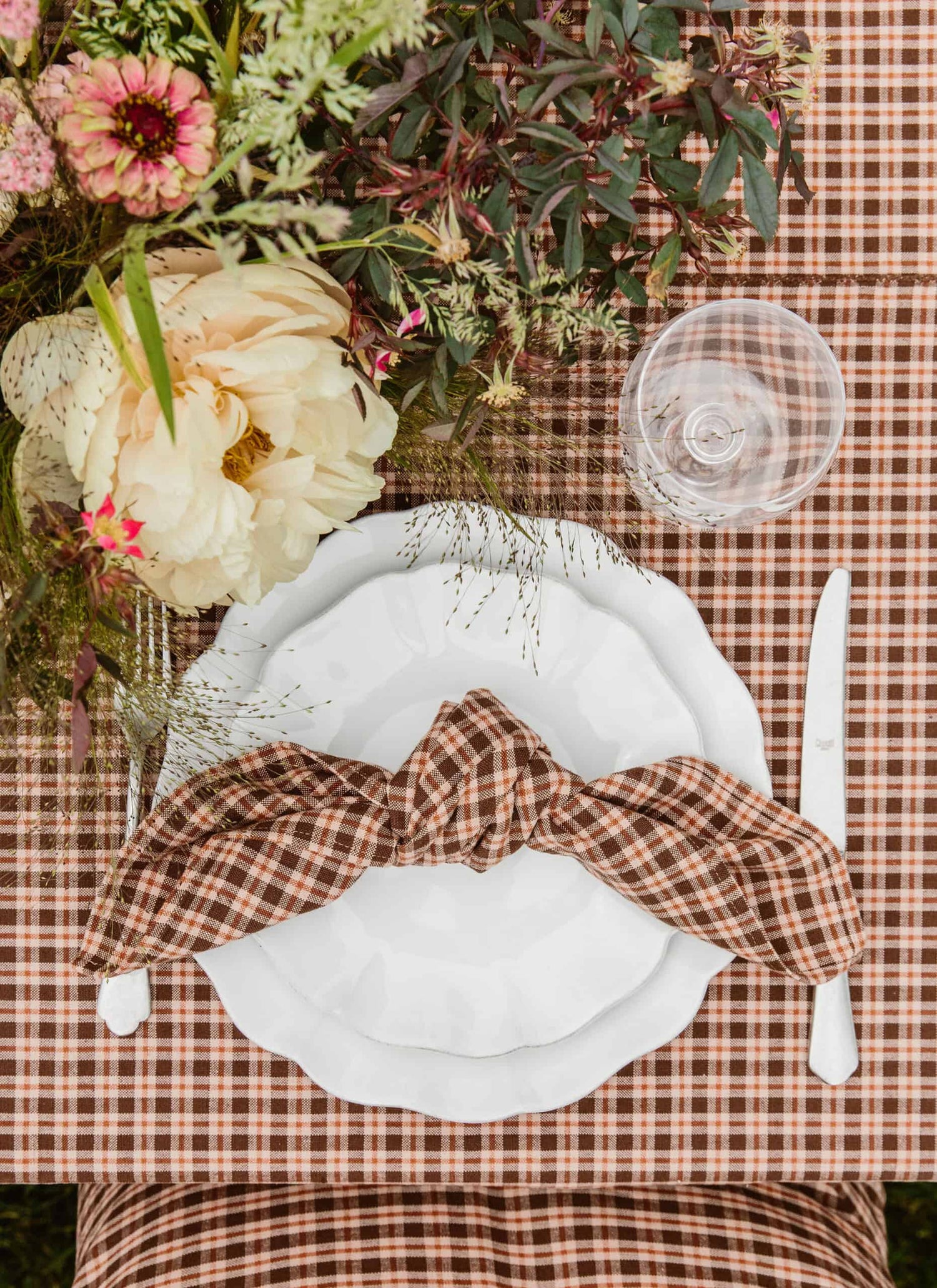 plaid napkin on table with flowers- Number 3