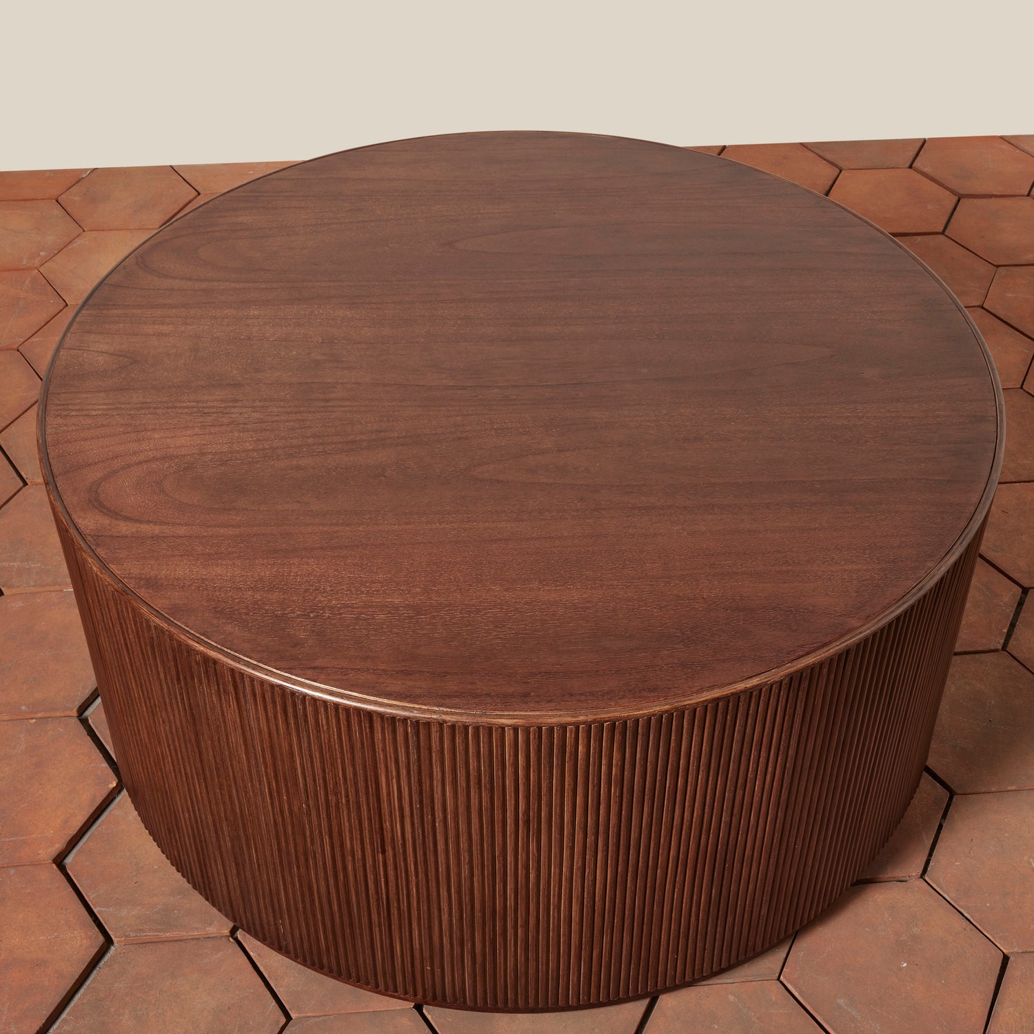 Round wooden table on a tiled floor- Number 4