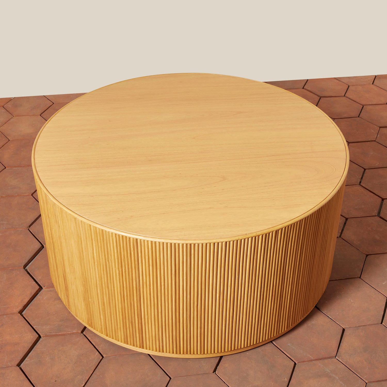 Round wooden table on a hexagonal tiled floor- Number 9
