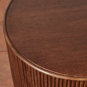 Close-up of a wooden side table with a textured surface - Number 4