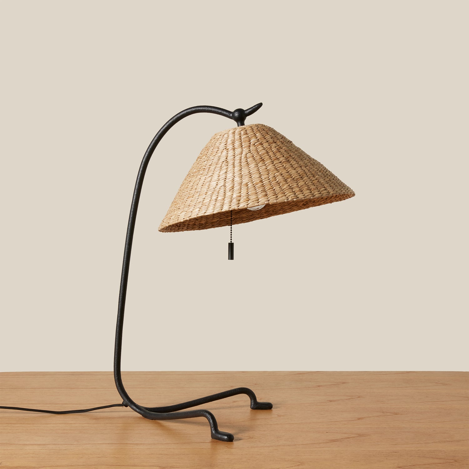 black and beige table lamp on top of wood table- Number 1
