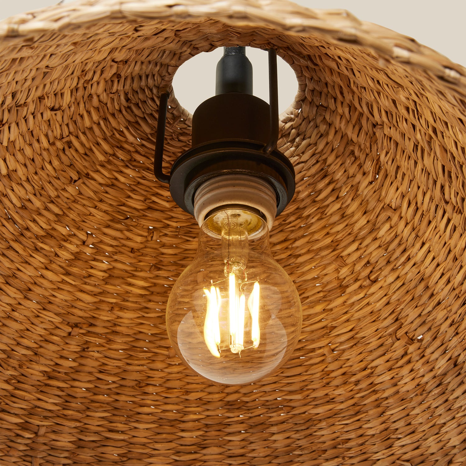 lightbulb inside rattan sconce- Number 7