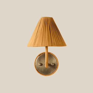 Wall-mounted lamp with pleated shade and metallic base on a beige background - Number 1