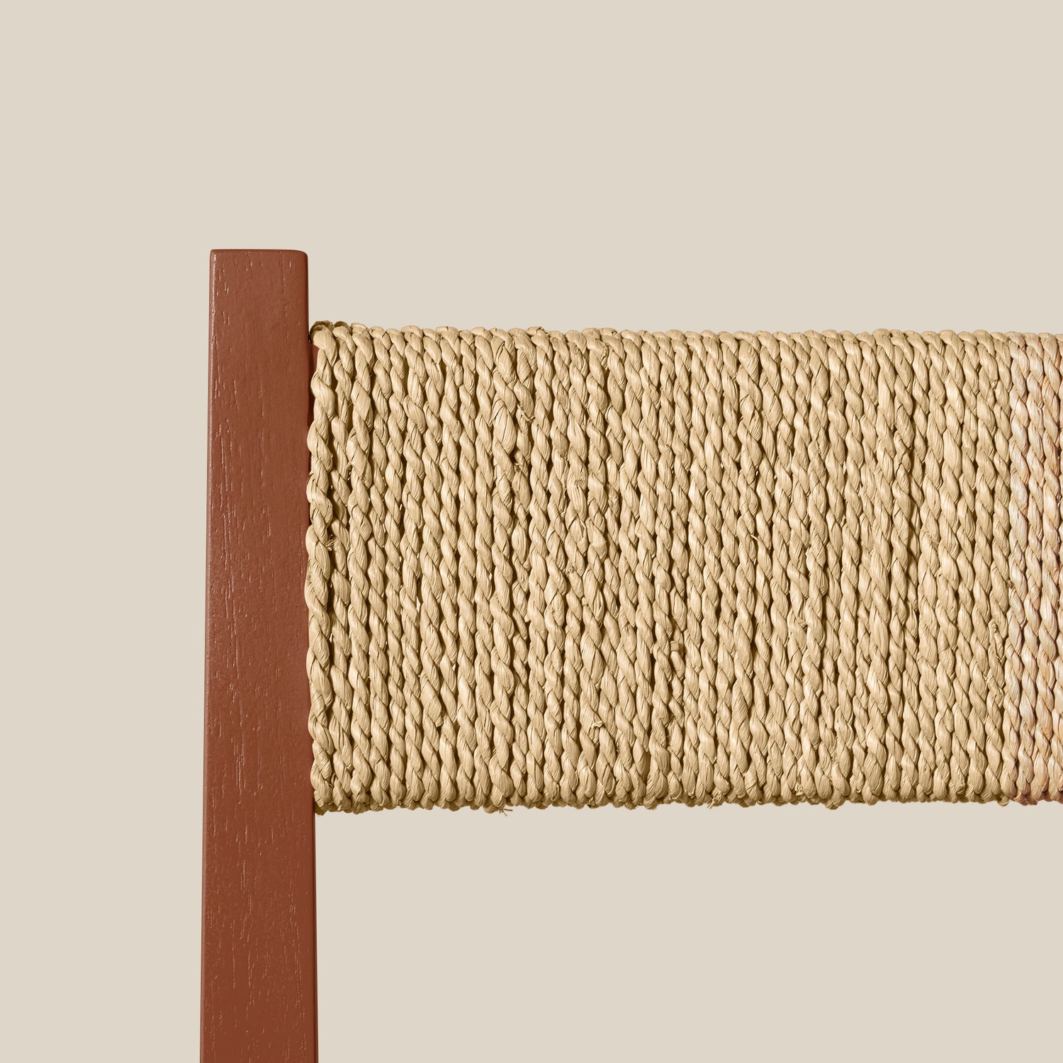 Woven seat rest with a wooden border on a beige background- Number 11