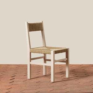 Wooden chair with woven seat and backrest on a wooden floor. - Number 9