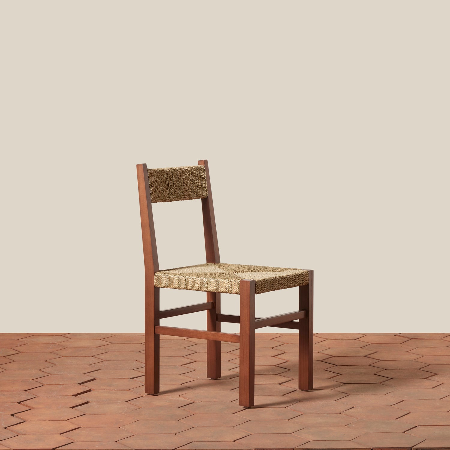 Wooden chair with woven seat and backrest on a wooden floor.- Number 9