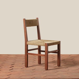 Wooden chair with woven seat and backrest on a wooden floor. - Number 21