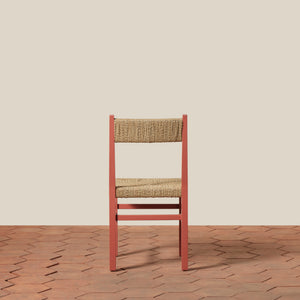 Chair with woven seat and backrest on a wooden floor and beige wall - Number 6
