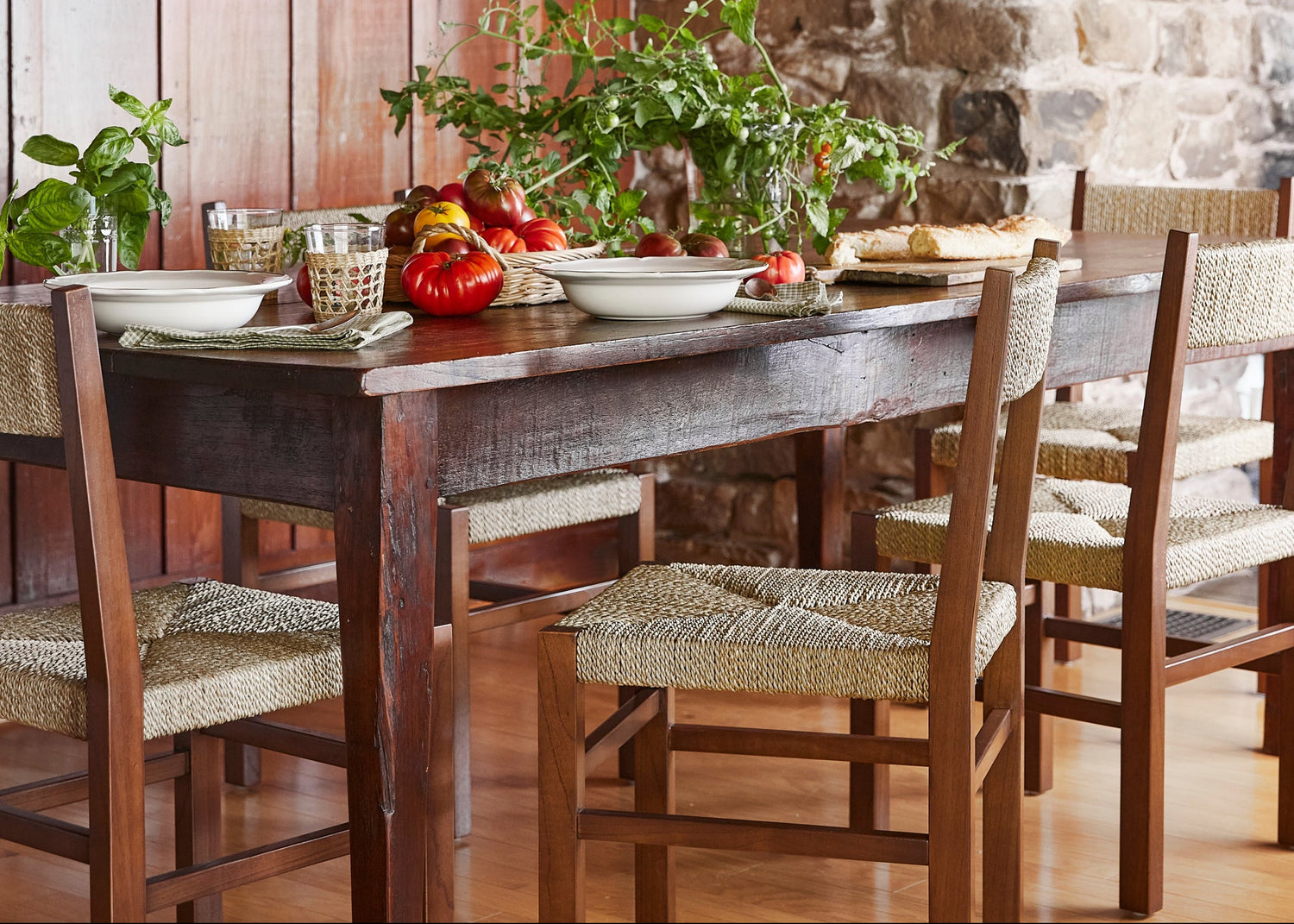 wood chairs next to table with greens and tomatoes on top- Number 2
