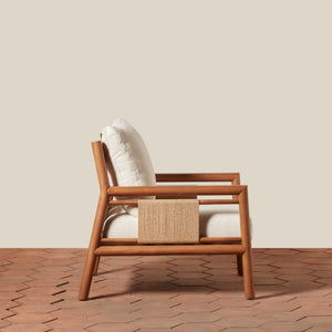 Wooden armchair with a woven side on a wooden floor and beige wall background - Number 8
