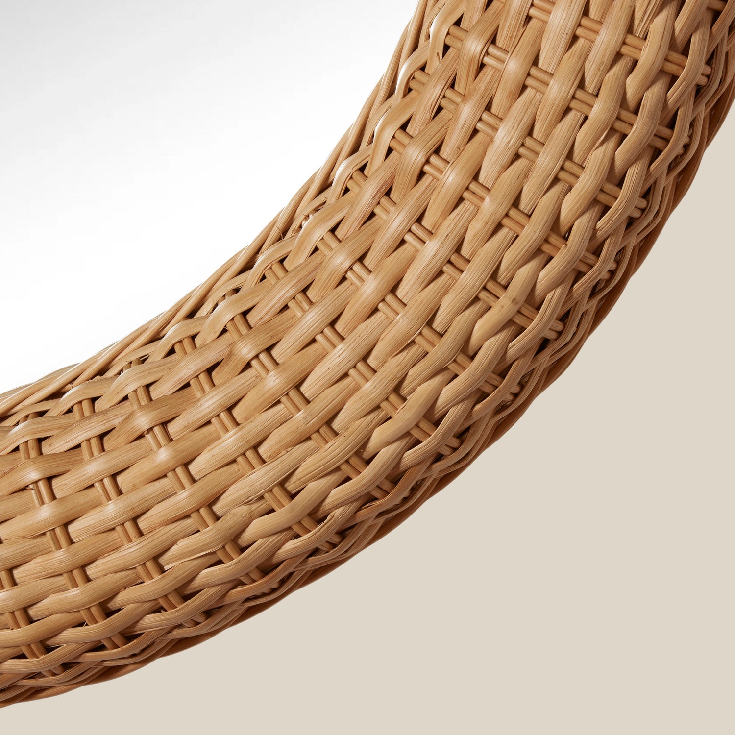 Close-up of a wicker chair backrest on a beige background- Number 3