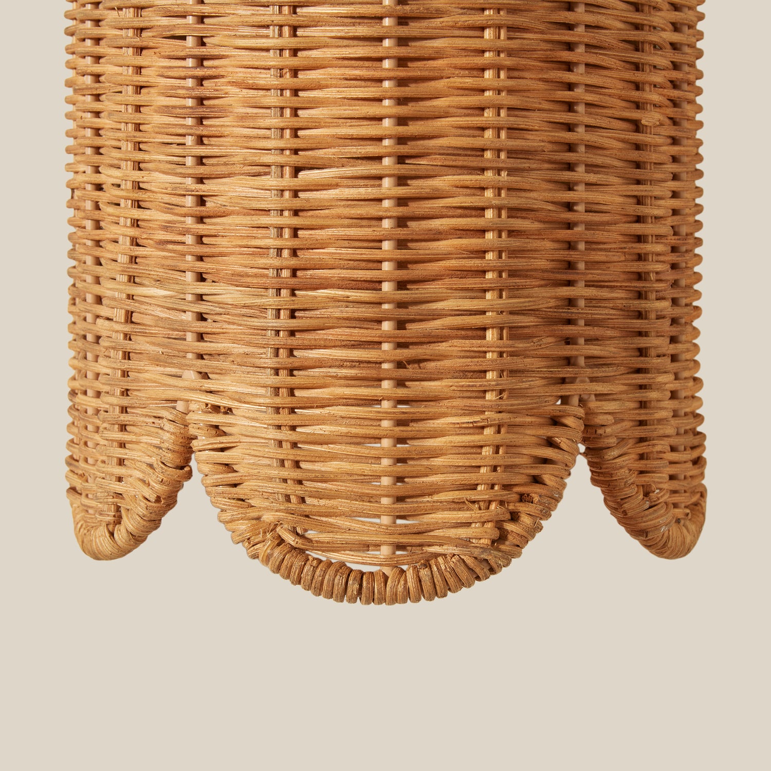 Woven rattan sconce on a beige background- Number 4