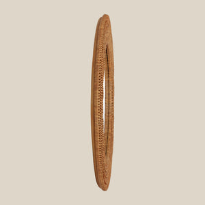 Woven brown mirror on a beige background - Number 3