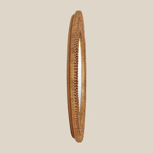 Woven mirror on a beige background - Number 3