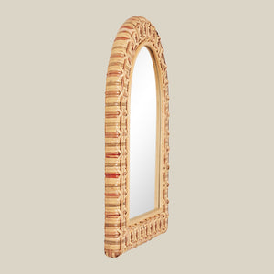 Decorative mirror with a wicker frame on a beige background - Number 4