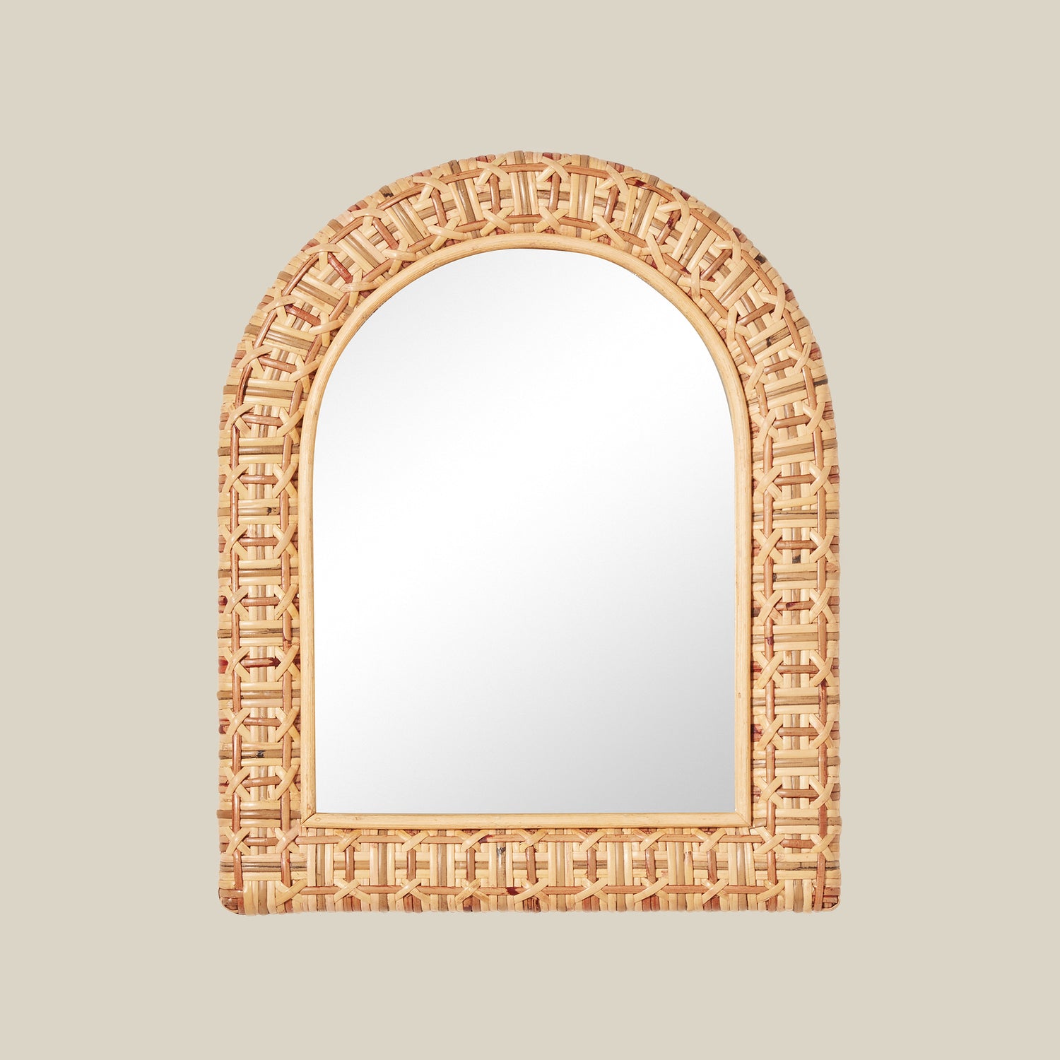 Decorative mirror with an arch-shaped, woven frame on a beige background- Number 1